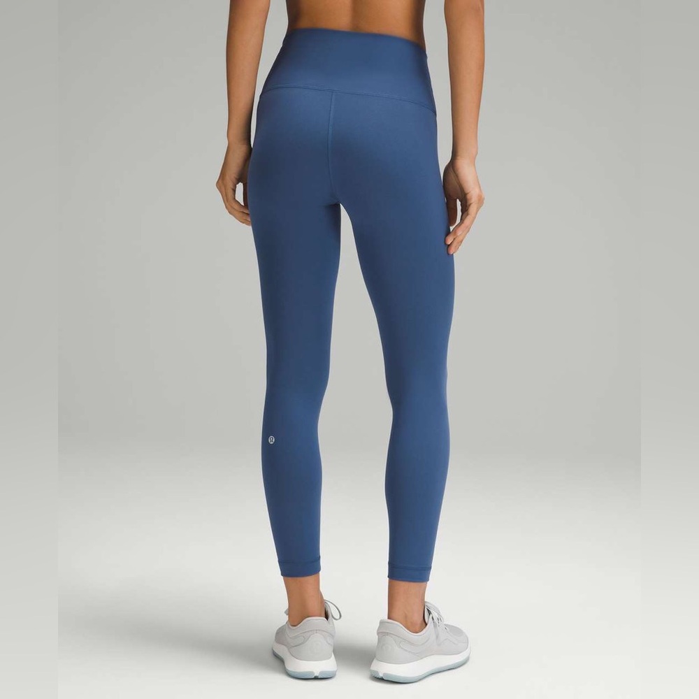 D - Lululemon Wunder Train High-Rise Tight 25"
Pitch Blue